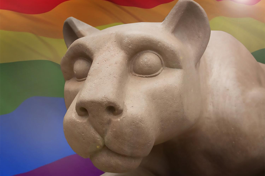 Nittany Lion statue with pride flag